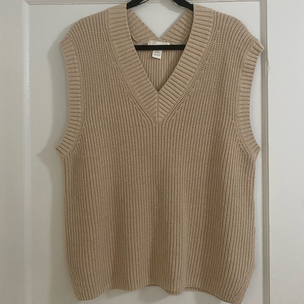 Cute light brown vest!